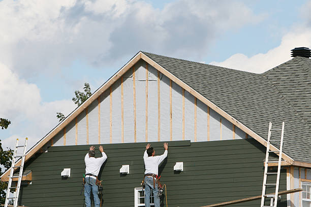 Professional Siding Installation technician working in Bryn Mawr, PA